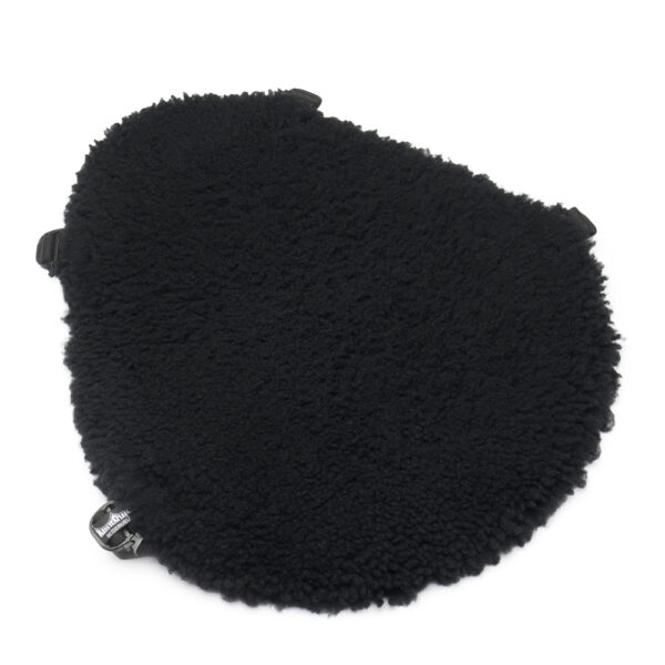 A black, fluffy sheepskin seat cover with adjustable straps
